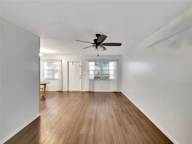 Live the relaxed Florida lifestyle in this desirable 1st floor on Vero Beach South Golf Course in Florida - for sale on GolfHomes.com, golf home, golf lot