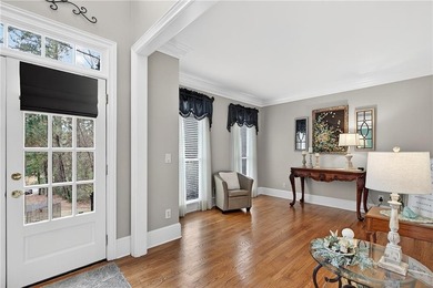 This stunning home in the prestigious gated with security guard on Whitewater Creek in Georgia - for sale on GolfHomes.com, golf home, golf lot