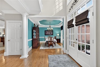 This stunning home in the prestigious gated with security guard on Whitewater Creek in Georgia - for sale on GolfHomes.com, golf home, golf lot