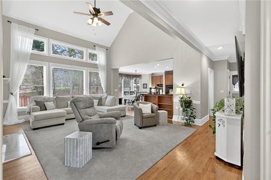 This stunning home in the prestigious gated with security guard on Whitewater Creek in Georgia - for sale on GolfHomes.com, golf home, golf lot