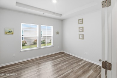 Why wait for new construction when you can have this like-new on Brunswick Plantation and Golf Resorts in North Carolina - for sale on GolfHomes.com, golf home, golf lot