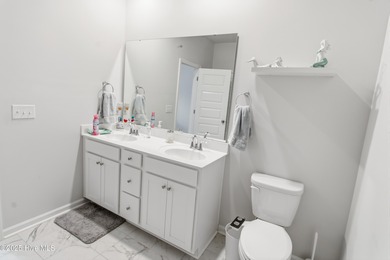 Why wait for new construction when you can have this like-new on Brunswick Plantation and Golf Resorts in North Carolina - for sale on GolfHomes.com, golf home, golf lot