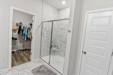 Why wait for new construction when you can have this like-new on Brunswick Plantation and Golf Resorts in North Carolina - for sale on GolfHomes.com, golf home, golf lot