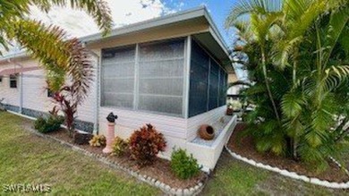 This stunning manufactured home boasts 2 bedrooms and 2 on Riverbend Golf and Country Club in Florida - for sale on GolfHomes.com, golf home, golf lot