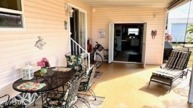 This stunning manufactured home boasts 2 bedrooms and 2 on Riverbend Golf and Country Club in Florida - for sale on GolfHomes.com, golf home, golf lot