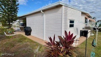 This stunning manufactured home boasts 2 bedrooms and 2 on Riverbend Golf and Country Club in Florida - for sale on GolfHomes.com, golf home, golf lot