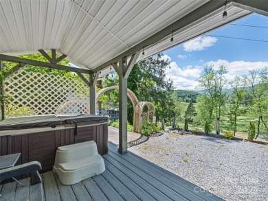 Welcome to 62 Cosmic Lane--your mountain haven in beautiful on Waynesville Country Club Inn in North Carolina - for sale on GolfHomes.com, golf home, golf lot