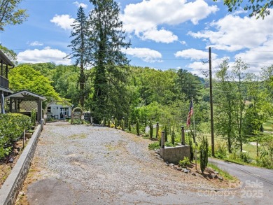 Welcome to 62 Cosmic Lane--your mountain haven in beautiful on Waynesville Country Club Inn in North Carolina - for sale on GolfHomes.com, golf home, golf lot