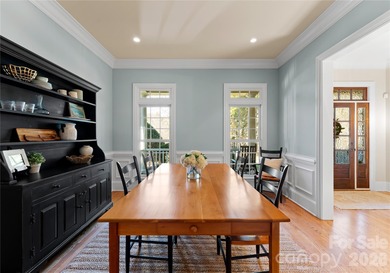 Timeless Southern charm meets lake living! Situated on a large on Trump National Golf Club Charlotte in North Carolina - for sale on GolfHomes.com, golf home, golf lot