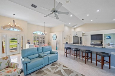 Impeccably remodeled 3-bedroom, 2-bath, 2-car garage pool home on Seminole Lakes Country Club in Florida - for sale on GolfHomes.com, golf home, golf lot