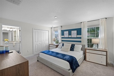 Discover the perfect blend of comfort, style, and location at on The Oasis Club at Champions Gate in Florida - for sale on GolfHomes.com, golf home, golf lot