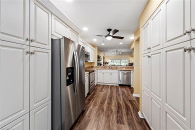 Move right into this low-maintenance, spacious townhouse in a on Estero Country Club in Florida - for sale on GolfHomes.com, golf home, golf lot