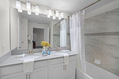 Discover the perfect blend of comfort, style, and location at on The Oasis Club at Champions Gate in Florida - for sale on GolfHomes.com, golf home, golf lot
