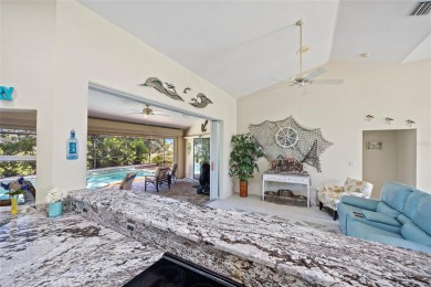 Impeccably remodeled 3-bedroom, 2-bath, 2-car garage pool home on Seminole Lakes Country Club in Florida - for sale on GolfHomes.com, golf home, golf lot