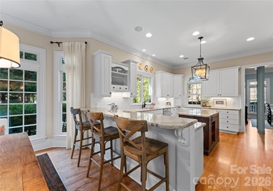 Timeless Southern charm meets lake living! Situated on a large on Trump National Golf Club Charlotte in North Carolina - for sale on GolfHomes.com, golf home, golf lot