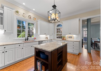 Timeless Southern charm meets lake living! Situated on a large on Trump National Golf Club Charlotte in North Carolina - for sale on GolfHomes.com, golf home, golf lot