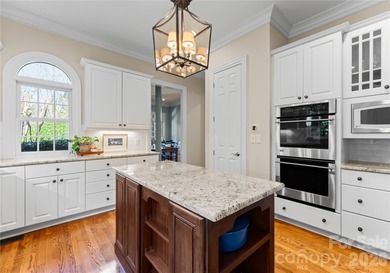 Timeless Southern charm meets lake living! Situated on a large on Trump National Golf Club Charlotte in North Carolina - for sale on GolfHomes.com, golf home, golf lot