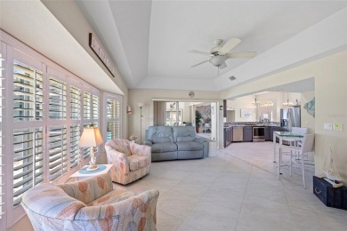 Impeccably remodeled 3-bedroom, 2-bath, 2-car garage pool home on Seminole Lakes Country Club in Florida - for sale on GolfHomes.com, golf home, golf lot