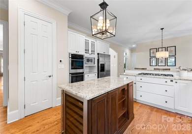 Timeless Southern charm meets lake living! Situated on a large on Trump National Golf Club Charlotte in North Carolina - for sale on GolfHomes.com, golf home, golf lot