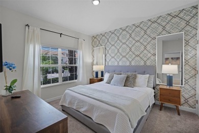 Discover the perfect blend of comfort, style, and location at on The Oasis Club at Champions Gate in Florida - for sale on GolfHomes.com, golf home, golf lot