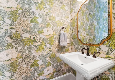 Timeless Southern charm meets lake living! Situated on a large on Trump National Golf Club Charlotte in North Carolina - for sale on GolfHomes.com, golf home, golf lot