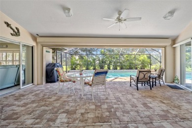 Impeccably remodeled 3-bedroom, 2-bath, 2-car garage pool home on Seminole Lakes Country Club in Florida - for sale on GolfHomes.com, golf home, golf lot