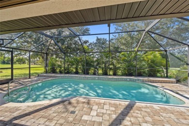 Impeccably remodeled 3-bedroom, 2-bath, 2-car garage pool home on Seminole Lakes Country Club in Florida - for sale on GolfHomes.com, golf home, golf lot