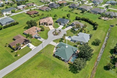 Impeccably remodeled 3-bedroom, 2-bath, 2-car garage pool home on Seminole Lakes Country Club in Florida - for sale on GolfHomes.com, golf home, golf lot