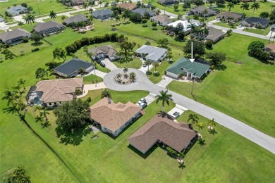 Impeccably remodeled 3-bedroom, 2-bath, 2-car garage pool home on Seminole Lakes Country Club in Florida - for sale on GolfHomes.com, golf home, golf lot