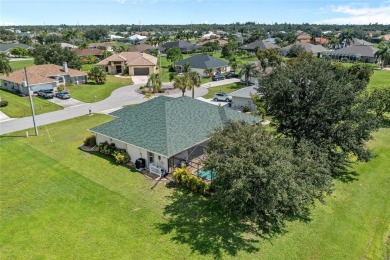 Impeccably remodeled 3-bedroom, 2-bath, 2-car garage pool home on Seminole Lakes Country Club in Florida - for sale on GolfHomes.com, golf home, golf lot