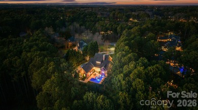Timeless Southern charm meets lake living! Situated on a large on Trump National Golf Club Charlotte in North Carolina - for sale on GolfHomes.com, golf home, golf lot