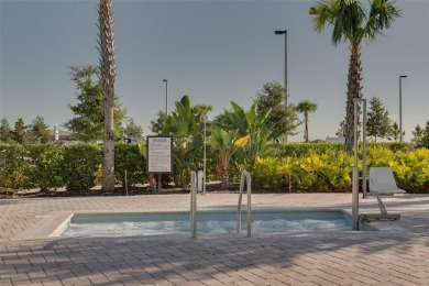 Discover the perfect blend of comfort, style, and location at on The Oasis Club at Champions Gate in Florida - for sale on GolfHomes.com, golf home, golf lot