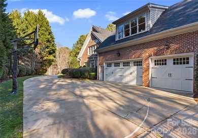 Timeless Southern charm meets lake living! Situated on a large on Trump National Golf Club Charlotte in North Carolina - for sale on GolfHomes.com, golf home, golf lot