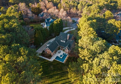Timeless Southern charm meets lake living! Situated on a large on Trump National Golf Club Charlotte in North Carolina - for sale on GolfHomes.com, golf home, golf lot