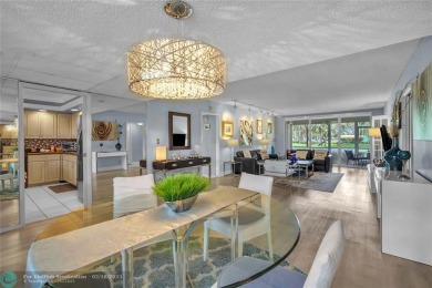 Step into this stunning first-floor unit in the highly on Palm-Aire Country Club and Resort - The Oaks in Florida - for sale on GolfHomes.com, golf home, golf lot