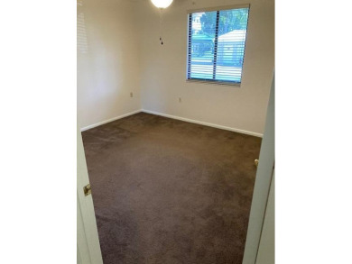 THIS 2/2  SPACIOUS AND PRISTINE CONDO IS MOVE IN READY.FIRST on Bear Lakes Country Club in Florida - for sale on GolfHomes.com, golf home, golf lot