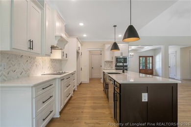 Welcome to this beautifully crafted 4 bedroom, 3 bath home on Carolina Lakes Country Club in North Carolina - for sale on GolfHomes.com, golf home, golf lot