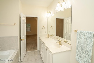 New Year, new price! Spring will be here before you know it and on Sea Trail Golf Resort in North Carolina - for sale on GolfHomes.com, golf home, golf lot