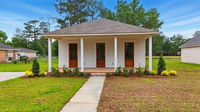 This CUSTOM built modern New Orleans style shotgun house has 3 on Millbrook Country Club in Mississippi - for sale on GolfHomes.com, golf home, golf lot