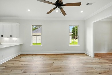 This CUSTOM built modern New Orleans style shotgun house has 3 on Millbrook Country Club in Mississippi - for sale on GolfHomes.com, golf home, golf lot