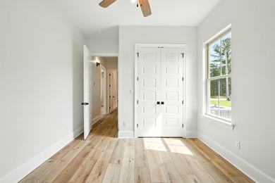 This CUSTOM built modern New Orleans style shotgun house has 3 on Millbrook Country Club in Mississippi - for sale on GolfHomes.com, golf home, golf lot