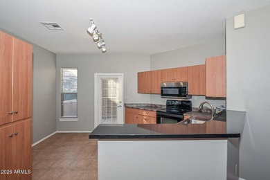 Highly sought-after 2 bed, 2 bath ground-floor townhome with on Wigwam Golf  Resort Litchfield Park  in Arizona - for sale on GolfHomes.com, golf home, golf lot