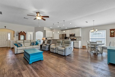 Welcome to a life that feels like vacation every day. Nestled in on Arlington Ridge Golf Club in Florida - for sale on GolfHomes.com, golf home, golf lot