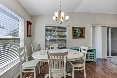 Welcome to a life that feels like vacation every day. Nestled in on Arlington Ridge Golf Club in Florida - for sale on GolfHomes.com, golf home, golf lot