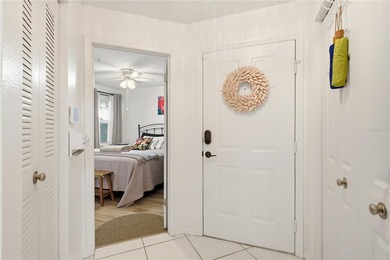 Beautifully maintained End-Unit Condo with Golf Course Views in on Feather Sound Country Club in Florida - for sale on GolfHomes.com, golf home, golf lot