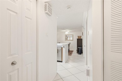 Beautifully maintained End-Unit Condo with Golf Course Views in on Feather Sound Country Club in Florida - for sale on GolfHomes.com, golf home, golf lot