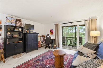 Beautifully maintained End-Unit Condo with Golf Course Views in on Feather Sound Country Club in Florida - for sale on GolfHomes.com, golf home, golf lot