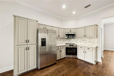 This beautiful three-bedroom two-bathroom home situated on Hole on Laurel Island Links in Georgia - for sale on GolfHomes.com, golf home, golf lot