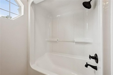 This beautiful three-bedroom two-bathroom home situated on Hole on Laurel Island Links in Georgia - for sale on GolfHomes.com, golf home, golf lot