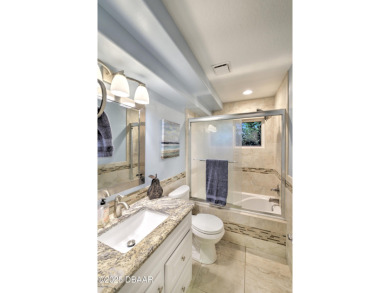 Beautifully remodeled and meticulously maintained, this on Spruce Creek Golf Club in Florida - for sale on GolfHomes.com, golf home, golf lot